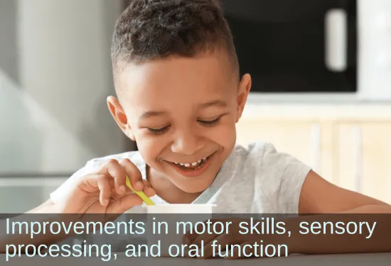 Smiling boy eating with spoon. Text: Improvements in motor skills, sensory Processing, and oral function.