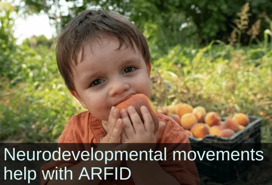 Toddler boy eating a peach. Text: Neurodevelopmental movements help with ARFID.