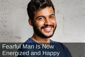 Relaxed man smiling into camera. Text: Fearful Man is now energized and happy.