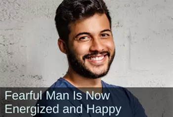 Smiling, confident man. Text: Fearful man is now energized and happy.