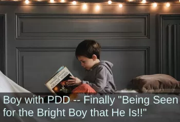 Boy reading in bed. Text: Boy with PDD—Finally "Being Seen for the Bright Boy that He Is!"