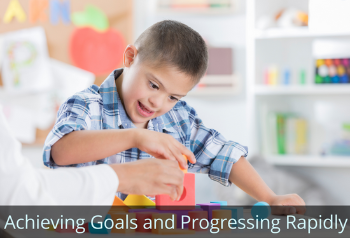 Boy playing with building blocks. Text: Achieving goals and progressing rapidly.