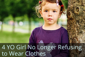 Young girl standing by tree. Text: 4-year-old girl no longer refusing to wear clothes.