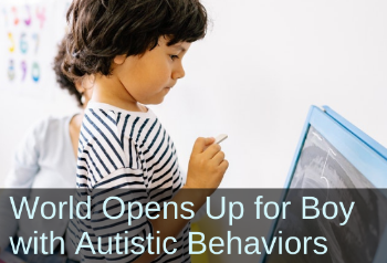 Boy at chalkboard. Text: World opens up for boy with Autistic behaviors.