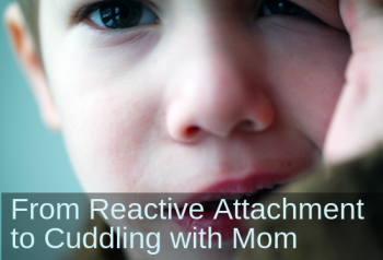 Concerned-looking boy with thumb in mouth. Text: From reactive attachment to cuddling with Mom.