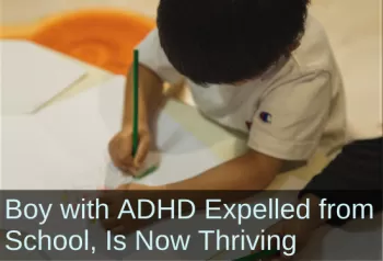 Young boy drawing at school. Text: Boy with ADHD Expelled from School, is Now Thriving