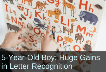 Fingers of a young person pointing out letters on an alphabet board. Text: 5-year-old boy: Huge gains in letter recognition