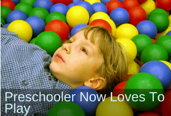  Boy in ball pit. Text: Preschooler now loves to play.