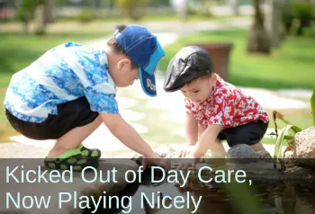  Two boys playing together. Text: Kicked out of daycare, now playing nicely.