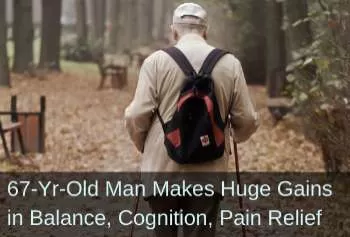 Elderly man with backpack on walking through forest