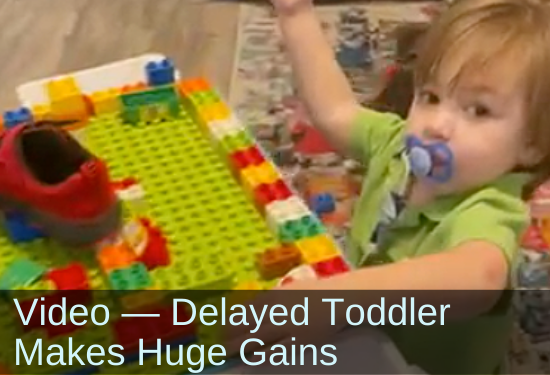 Young boy playing with Legos. Text: Video—Delayed toddler makes huge gains.